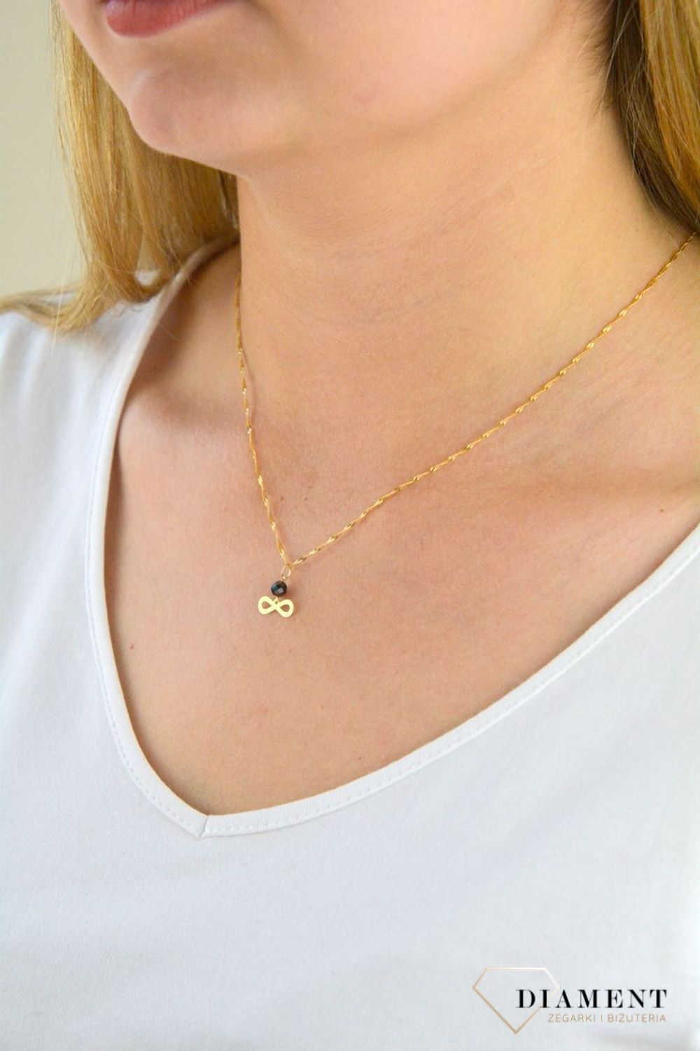 Złota zawieszka 585 nieskończoność z czarną cyrkonią ZA 4751.jpg